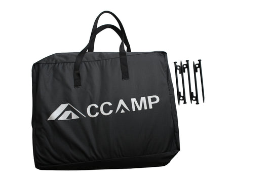 Black bag with 'CCAMP' logo on a white surface
