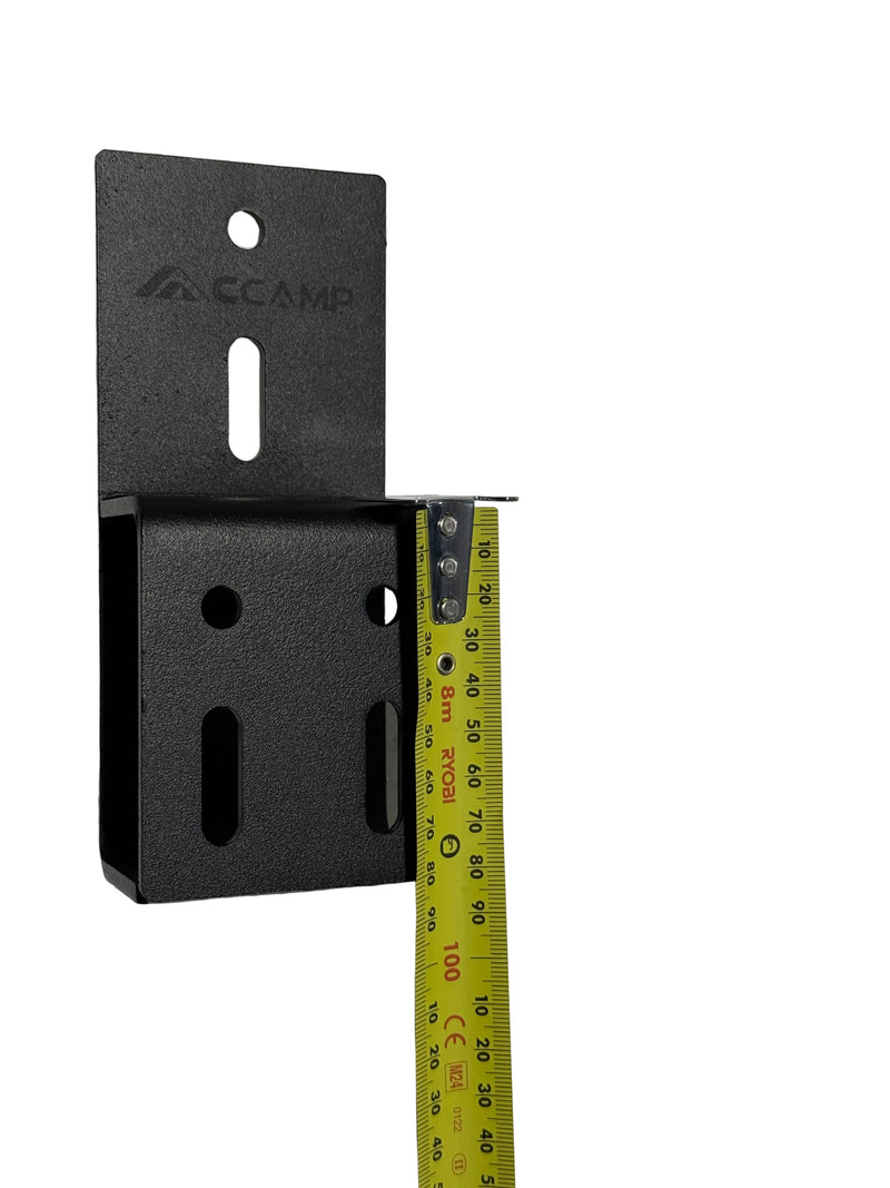 Load image into Gallery viewer, Black metal bracket with a measuring tape showing its dimensions on a gray surface
