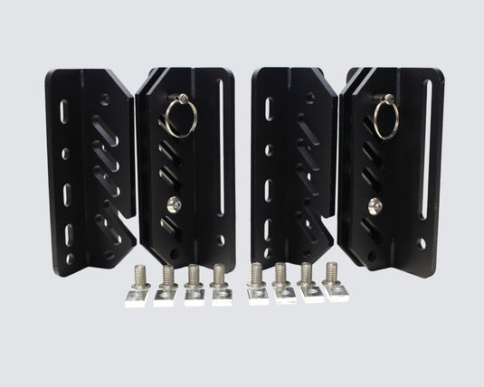 Set of black metal brackets with screws on a light gray background