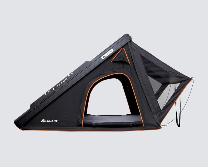 Black and orange tent with 'CAMP' branding on a light gray background